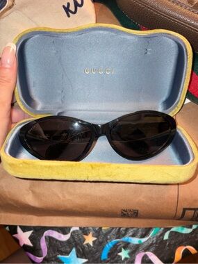 Gucci Women’s Black Cat-Eye Sunglasses with Yellow Velvet Case